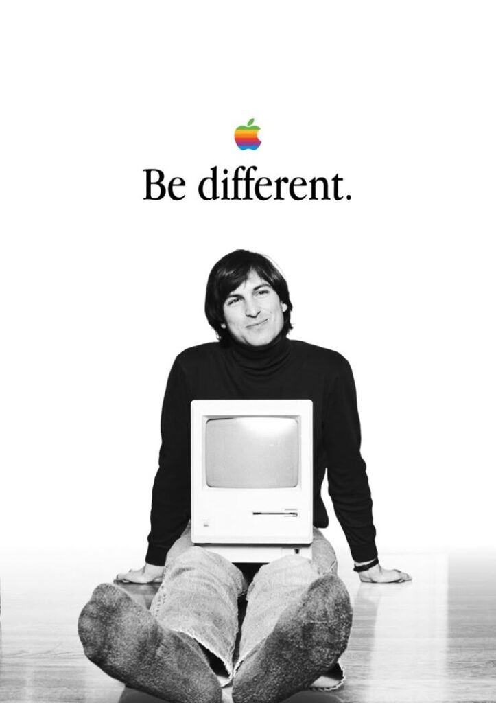 Image of Steve Jobs with text above him saying "Be different"