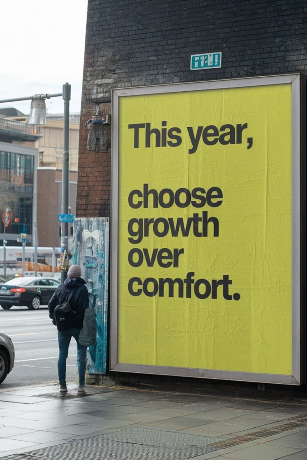 Advertisement of a quote, "This year choose growth over comfort"